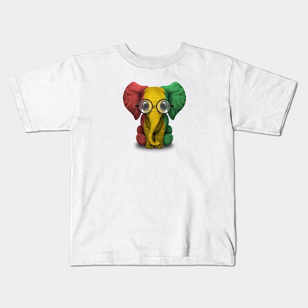 Baby Elephant with Glasses and Guinea Flag Kids T-Shirt by jeffbartels